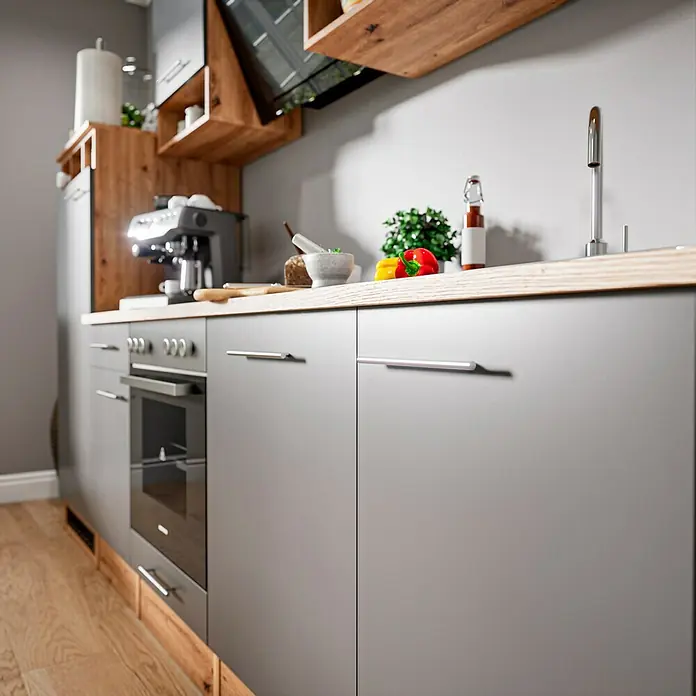 Respekta Composición de cocina Hilde - Ancho: 280 cm, Gris, Con electrodomésticos - Armarios de cocina grises con una encimera de madera, mostrando un diseño de cocina moderno y elegante.