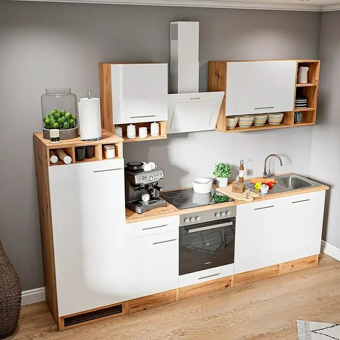 Respekta Composición de cocina Hilde - Ancho: 280 cm, Blanco, Con electrodomésticos - Una cocina moderna con armarios blancos, detalles de madera y electrodomésticos como cafetera y encimera.