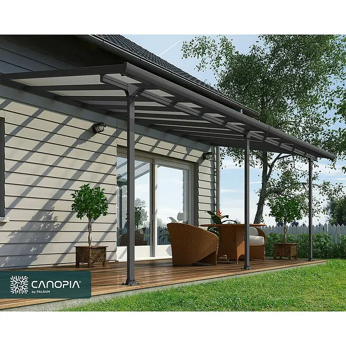 Solid Elements Marquesina adosada Feria - An x Pr: 610 x 300 cm, Gris antracita, Policarbonato, Transparente - Cubierta de patio con techo sombreado y elegantes muebles de exterior en una terraza de madera.