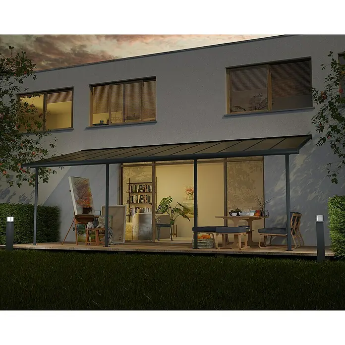 Palram – Canopia Terrassenüberdachung Sierra - B x T: 739 x 299 cm, Anthrazitgrau, Polycarbonat, Klar - Überdachte Terrasse mit Kunstatelier und Esstisch. Die Überdachung schützt vor Witterungseinflüssen und bietet zusätzlichen Raum im Freien.