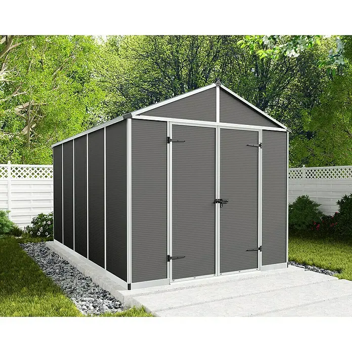 Palram – Canopia Gartenhaus Rubicon - Außenmaß inkl. Dachüberstand (B x T): 2,37 x 3,77 m, Kunststoff, Grau - Gartenhaus aus Metall mit Doppeltür und grauem Paneel-Design, umgeben von Grün. Ideal zur Aufbewahrung von Gartengeräten.