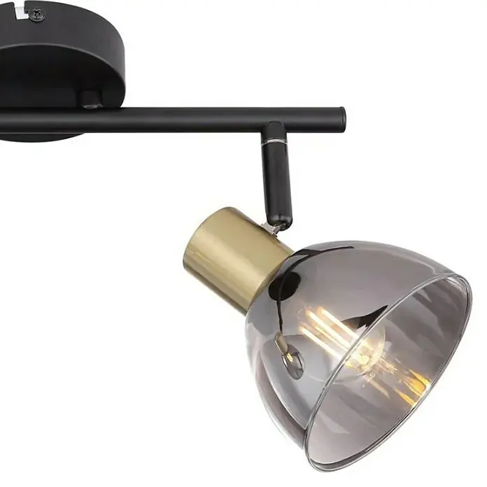 Globo Regleta Jay - 25 W, L x An x Al: 30 x 11 x 17,5 cm, Negro, E14 - Primer plano de una elegante lámpara de foco negra y dorada, que combina diseño moderno y funcionalidad.