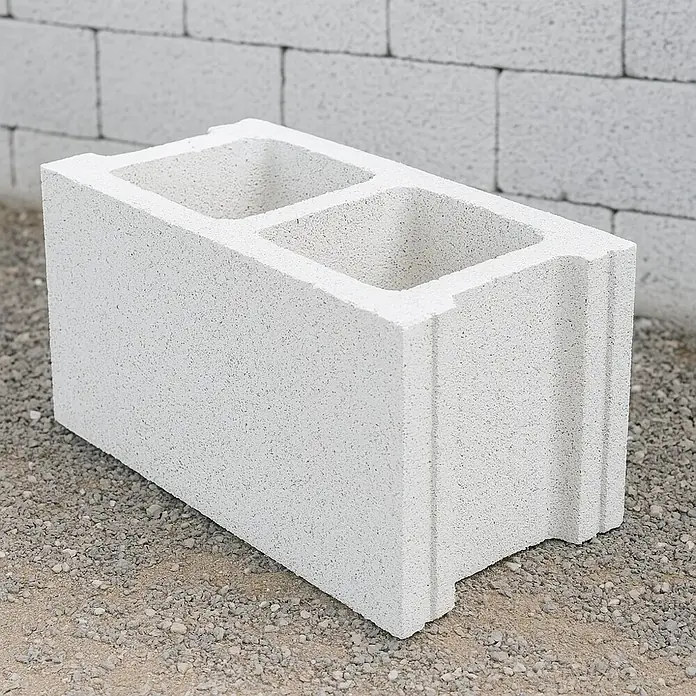BHS Madrid Bloque de hormigón poroso caravista - 40 x 20 x 20 cm, Blanco, Hormigón - Primer plano de un bloque de hormigón blanco con dos agujeros, ideal para construcción.