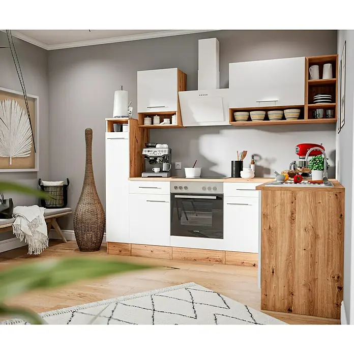 Respekta Cocina esquinera Hilde - Ancho: 250 cm, Blanco, Mate, Efecto madera, Con electrodomésticos - Vista de una cocina elegante con armarios blancos, detalles de madera y electrodomésticos modernos, creando un ambiente acogedor.