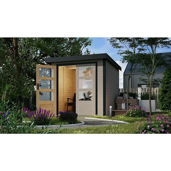 Karibu Gartenhaus Jupiter 2 D - Außenmaß inkl. Dachüberstand (B x T): 228,5 x 235 cm, Holz, Wassergrau/Anthrazit - Ein modernes Gartenhaus mit grauer Holzverkleidung, Flachdach und gläsernen Türen inmitten einer üppigen Gartenlandschaft.