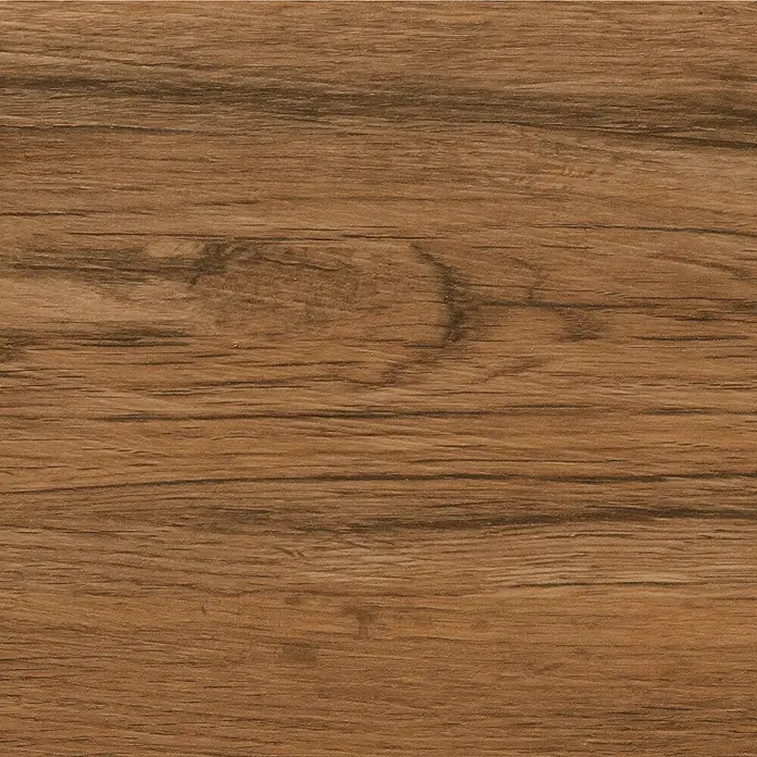 Feinsteinzeugfliese Natura - 22,5 x 90,2 cm, Honey, Matt - Nahaufnahme einer Holzoberfläche mit feiner Maserung und warmen Brauntönen, die eine rustikale und natürliche Ästhetik vermittelt.