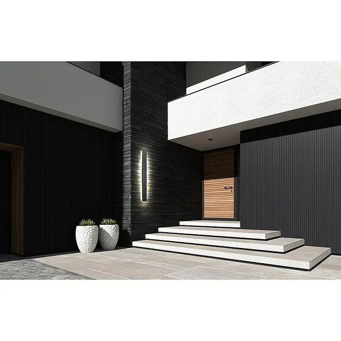 E2 elektro LED-Außenwandleuchte Rigel - 20 W, 10 x 9,5 x 3,7 cm, Anthrazit, IP65 - Eingangsbereich eines modernen Hauses mit einer hellen Holzhaustür und stilvollen Außentreppen, beleuchtet durch eine elegante Wandleuchte.