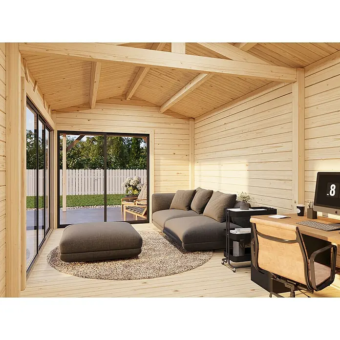 Palmako Gartenhaus Amanda Slide - Außenmaß inkl. Dachüberstand (B x T): 917 x 340 cm, Tauchgrundiertes Holz, Grau - Innenansicht eines hölzernen Gartenbüros mit Sofa, Teppich und Schreibtisch. Der Raum ist hell und freundlich.