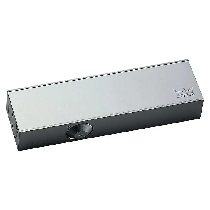 dormakaba Türschließer TS 73 V EN 2-4 - Silber, Max. Türbreite: 1.100 mm - Türschließer der Marke DORMA in Silber. Der Türschließer ist rechteckig und hat eine Schraube an der Seite.
