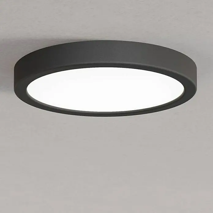 Eglo connect.z LED-Panel rund Fueva 6-Z - 11,2 W, Ø x H: 21 x 2,5 cm, Schwarz, RGBW - Nahaufnahme einer runden, modernen Deckenleuchte mit einem dunklen Rahmen und hellem, diffusem Licht.