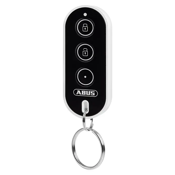 Abus Alarmanlagen-Set Smartvest Pro FUAA45000 - Akustischer Alarm - Nahaufnahme der ABUS-Funkfernbedienung für Alarmanlagen, mit drei Tasten und einem Schlüsselanhänger, zur Steuerung des Alarmsystems.