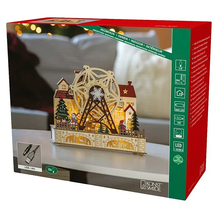 Konstsmide LED-Szenerie Weihnachtsmarkt - L x B x H: 28 x 12 x 24,5 cm, Weiß, Batteriebetrieben, LED - Das Bild zeigt die Verpackung eines Weihnachtsdekorationsobjekts, ein beleuchtetes Holz-Riesenrad mit weihnachtlichen Motiven und warmweissem Licht.