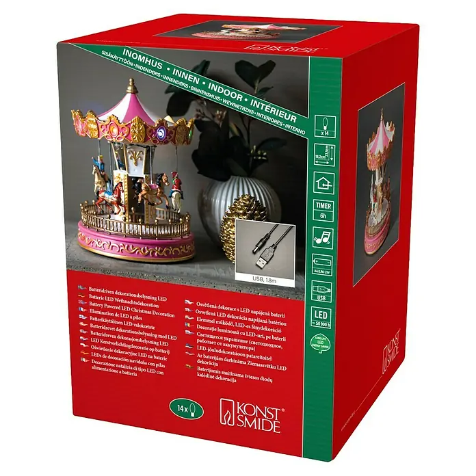 Konstsmide LED-Szenerie Weihnachtskarusell - L x B x H: 18,2 x 18,2 x 23,5 cm, Rosa, Batteriebetrieben, LED - Verpackung für ein batteriebetriebenes LED-Weihnachtsdekorations-Karussell von Konstsmide.