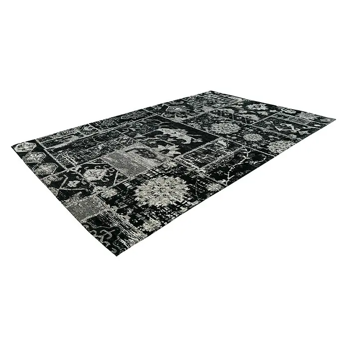 Kayoom Flachgewebeteppich River 150 - Schwarz/Grau, 150 x 80 cm, 70 % Baumwolle, 30 % Polyester - Dieser Teppich zeigt ein modernes Patchwork-Design in Schwarz- und Grautönen, das jedem Raum einen Hauch von Eleganz und Stil verleiht.