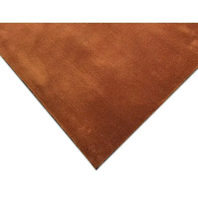 Alfombra de pelo corto Toscana - Teja, 110 x 60 cm, 100% Poliéster, Antideslizante - Primer plano de un trozo de cuero color cobre, ideal para manualidades y proyectos de cuero.
