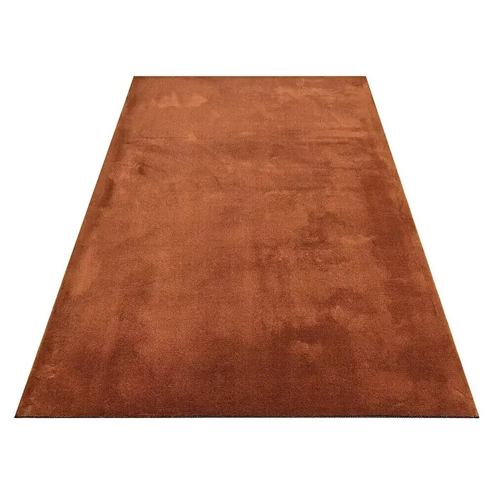 Alfombra de pelo corto Toscana - Teja, 110 x 60 cm, 100% Poliéster, Antideslizante - Primer plano de una alfombra marrón con una textura sutil, perfecta para añadir calidez a cualquier habitación.