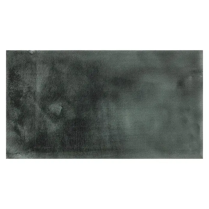 Alfombra de pelo corto Bunny - Verde, 110 x 60 cm, 100% poliéster - Primer plano de una alfombra suave y gris con textura visible, ideal para añadir calidez y estilo a los espacios.