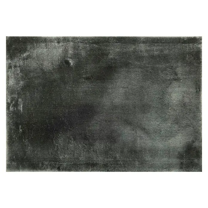 Alfombra de pelo largo Cuba - Gris, 110 x 60 cm, 100% Poliéster - Vista detallada de una superficie textil gris y texturizada con sutiles variaciones de color e iluminación suave y difusa.