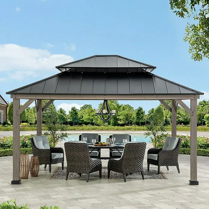 Sunjoy Pavillon Rysy - L x B: 450 x 390 cm, Farbe Dach: Schwarz - Gartenpavillon-Set mit Esstisch und Stühlen für stilvolle Outdoor-Unterhaltung. Genießen Sie Komfort und Eleganz im Freien.