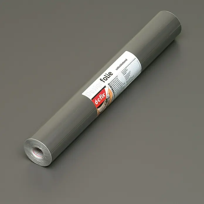 D-c-fix Klebefolie Uni Seidenmatt - 200 x 67,5 cm, Anthrazit, Selbstklebend - Eine Rolle selbstklebende Designfolie von d-c-fix in Grau, perfekt für DIY-Projekte und zur individuellen Gestaltung von Möbeln und Oberflächen.