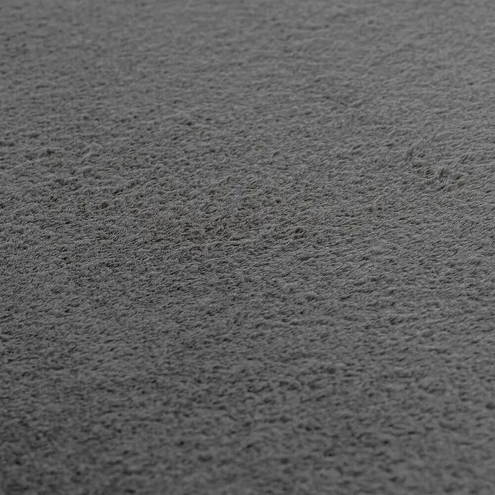 Kurzflorteppich Joy - Grau, 220 x 160 cm, 100 % Polyester - Nahaufnahme eines grauen Teppichs, der eine weiche und luxuriöse Textur zeigt. Ideal für Komfort und Stil in jedem Raum.