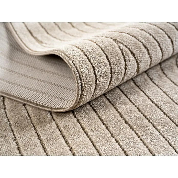 Outdoor-Teppich Nova I - Beige, Durchmesser: 80 cm, 100 % Polypropylen - Nahaufnahme eines beigen Teppichs mit Streifenmuster, der eine weiche und einladende Textur zeigt.