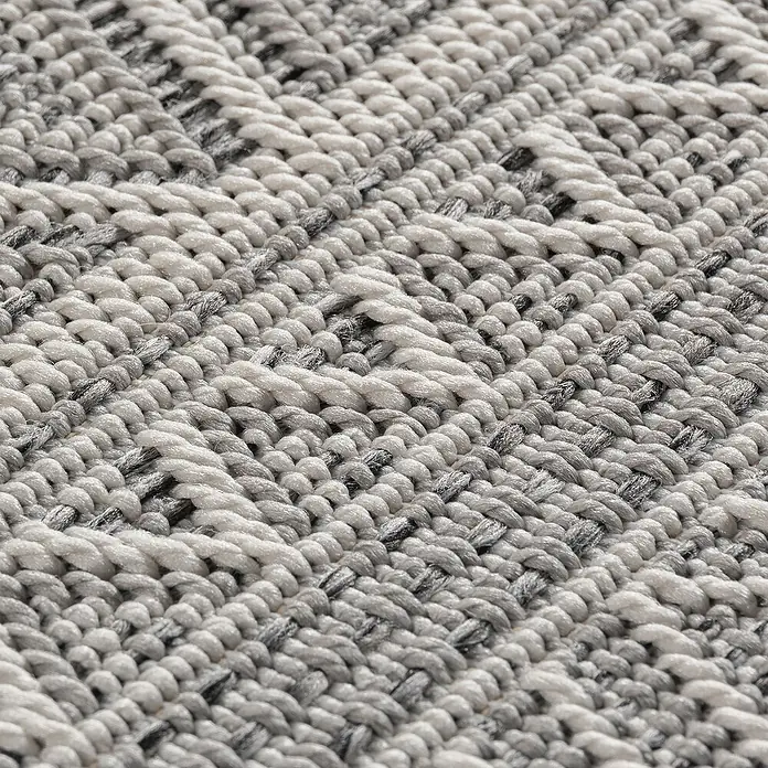 Outdoor-Teppich Desert 1303 - Grau, 200 x 140 cm, 100 % Polypropylen - Detailaufnahme eines gewebten Teppichs in Grau- und Weißtönen, der eine hochwertige Textur und Verarbeitung zeigt.