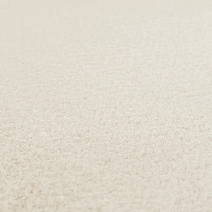 Kurzflorteppich Joy - Creme, 280 x 200 cm, 100 % Polyester - Nahaufnahme eines beigen Teppichs mit weicher Textur, der Komfort und Wärme in jeden Raum bringt. Ideal, um jedem Raum eine gemütliche und stilvolle Note zu verleihen.