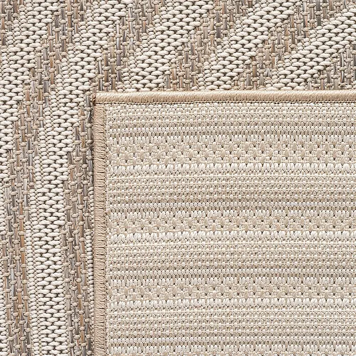 Outdoor-Teppich Desert 1301 - Beige, Durchmesser: 120 cm, 100 % Polypropylen - Nahaufnahme eines beigen Outdoor-Teppichs mit Bordüre. Das Material besteht aus robusten Fasern und ist wetterfest für den Außenbereich.