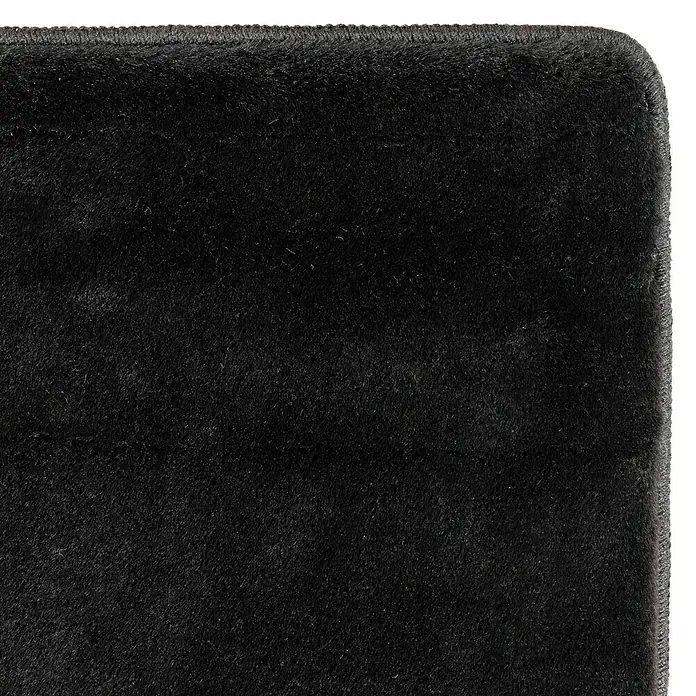 Kurzflorteppich Joy - Schwarz, 220 x 160 cm, 100 % Polyester - Nahaufnahme eines schwarzen, flauschigen Teppichs, der sich ideal für einen stilvollen und bequemen Wohnraum eignet.