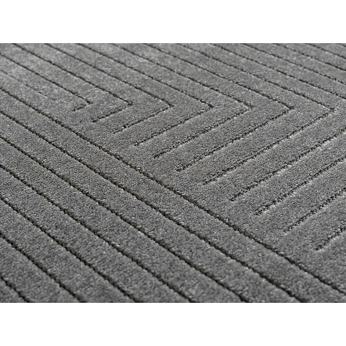 Outdoor-Teppich Nova II - Silver, Durchmesser: 80 cm, 100 % Polypropylen - Detailaufnahme eines modernen, grauen Teppichs mit einem geometrischen Zickzackmuster, ideal für stilvolle Innenräume.