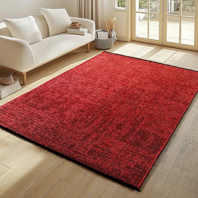 Flachgewebeteppich Space - Rot, 200 x 140 cm, 84 % Baumwolle, 16 % Polyester - Roter Teppich im Wohnzimmer. Der Teppich hat einen dunklen Rand und eine leicht strukturierte Oberfläche.