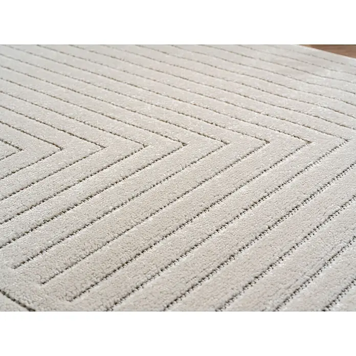 Outdoor-Teppich Nova II - Creme, 230 x 160 cm, 100 % Polypropylen - Nahaufnahme eines Teppichs mit modernem Zickzackmuster in hellen Farben.