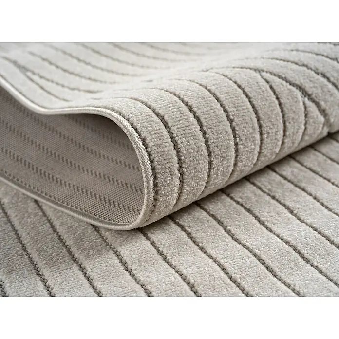 Outdoor-Teppich Nova I - Cream, Durchmesser: 200 cm, 100 % Polypropylen - Detailaufnahme eines beigefarbenen Teppichs mit Streifenmuster, der eine weiche und moderne Textur zeigt.