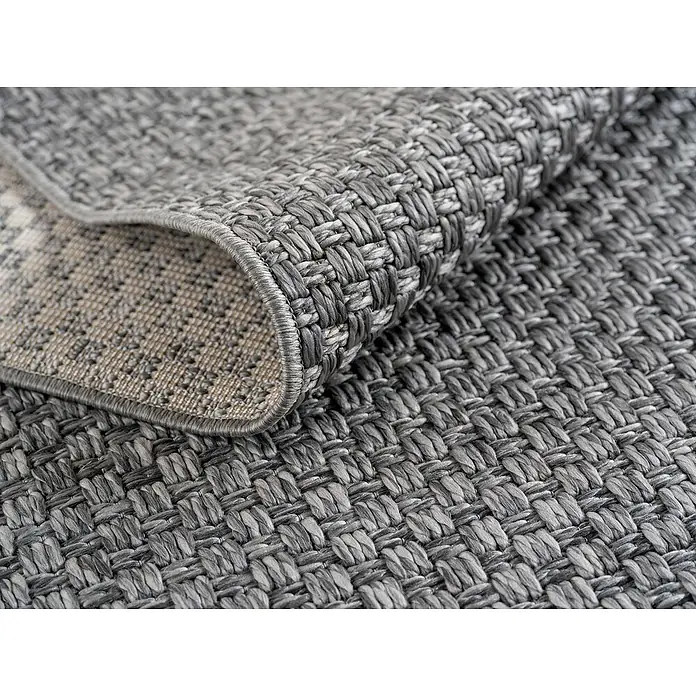 Outdoor-Teppich Ibiza II - Grau, 370 x 280 cm, 100 % Polypropylen - Nahaufnahme eines grauen Teppichs mit gewebter Textur, der eine robuste und stilvolle Option für jeden Raum darstellt.