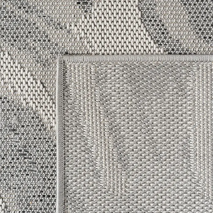 Outdoor-Teppich Desert 1302 - Grau, 290 x 200 cm, 100 % Polypropylen - Nahaufnahme eines stilvollen grauen Teppichs mit einem feinen Webmuster, perfekt für moderne Wohnräume.