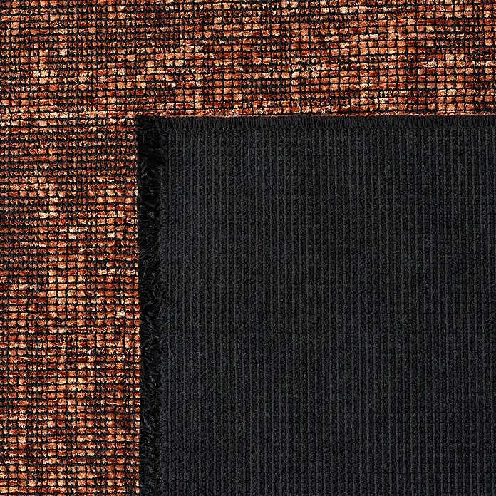 Flachgewebeteppich Space - Kupfer, 290 x 200 cm, 84 % Baumwolle, 16 % Polyester - Nahaufnahme eines Teppichs mit einem abstrakten, orangefarbenen Muster und einer schwarzen Unterseite.
