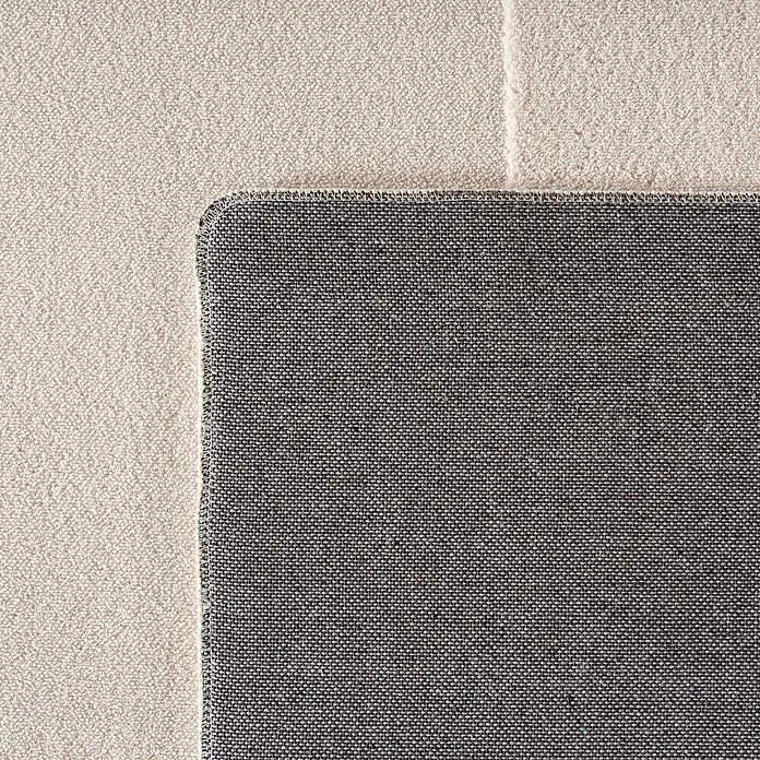 Kurzflorteppich Pompei 1614 - Creme, 230 x 160 cm, 100 % Polyester - Nahaufnahme eines grauen Teppichs mit beiger Bordüre, der die Textur und das Design des Teppichs hervorhebt. Ideal für Wohnraumgestaltung.