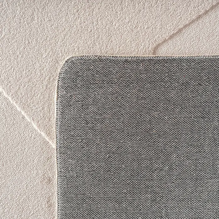 Kurzflorteppich Pompei 1613 - Creme, 230 x 160 cm, 100 % Polyester - Detailansicht eines zweifarbigen Teppichs, der die Textur und die Verarbeitung des Produkts hervorhebt.