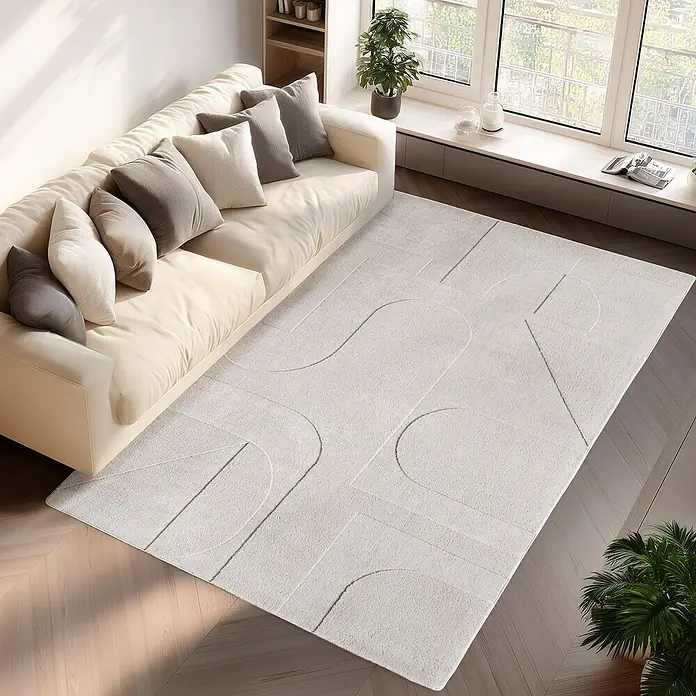 Kurzflorteppich Pompei 1614 - Creme, 230 x 160 cm, 100 % Polyester - Helle Wohnzimmeransicht mit einem cremefarbenen Sofa und einem modernen, weißen Teppich mit geometrischen Mustern.