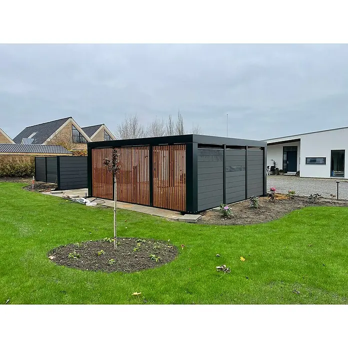 Carport Cubus - Außenmaß inkl. Dachüberstand (B x T): 5,8 x 5,5 m, Doppelcarport, Grau - Moderne Gartengestaltung mit einem stilvollen Gerätehaus, das sich perfekt in die grüne Umgebung einfügt. Das Holzdesign verleiht dem Garten einen warmen Akzent.