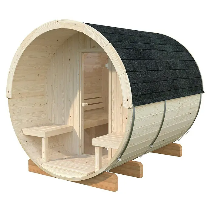 Palmako Fasssauna Anita - Natur, Ohne Ofen, Glastür, 254 x 226 x 225 cm - Diese Abbildung zeigt eine Fasssauna aus Holz mit einem dunklen, schindelgedeckten Dach und Bänken im Innenraum. Die Sauna steht auf Holzblöcken.