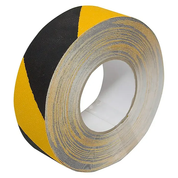 Cinta antideslizante AC-144-5 - Amarillo/Negro, L x An: 18,3 m x 50 mm - Un rollo de cinta antideslizante con rayas negras y amarillas para mayor seguridad y mejor agarre. Ideal para escaleras y superficies lisas.