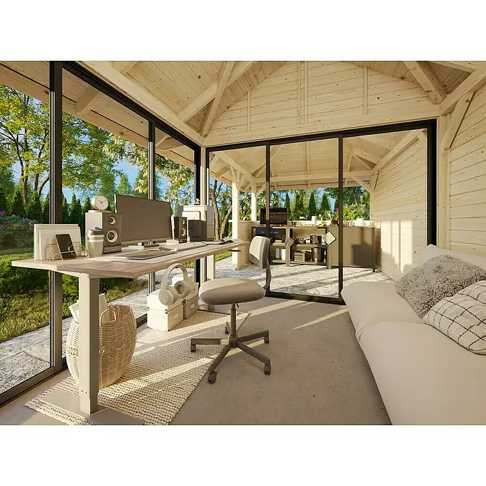 Palmako Caseta de jardín Bianca Set 507 Slide Plus - Medidas ext. (An x Pr): 672 x 384 cm, Madera, Natural - Espacio de trabajo en una caseta de jardín de madera llena de luz con escritorio, silla y sofá.