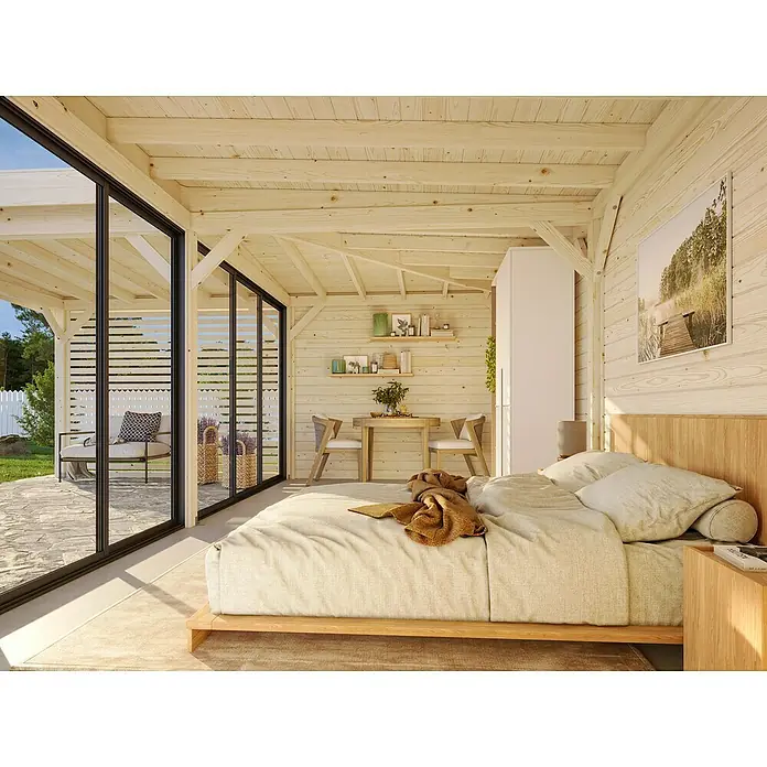 Palmako Caseta de jardín Lenna Set 413 Slide - Medidas ext. (An x Pr): 628 x 628 cm, Madera, Natural - Dormitorio luminoso con una gran cama y detalles en madera. La cama está adornada con almohadas claras y una manta, invitando a la relajación.