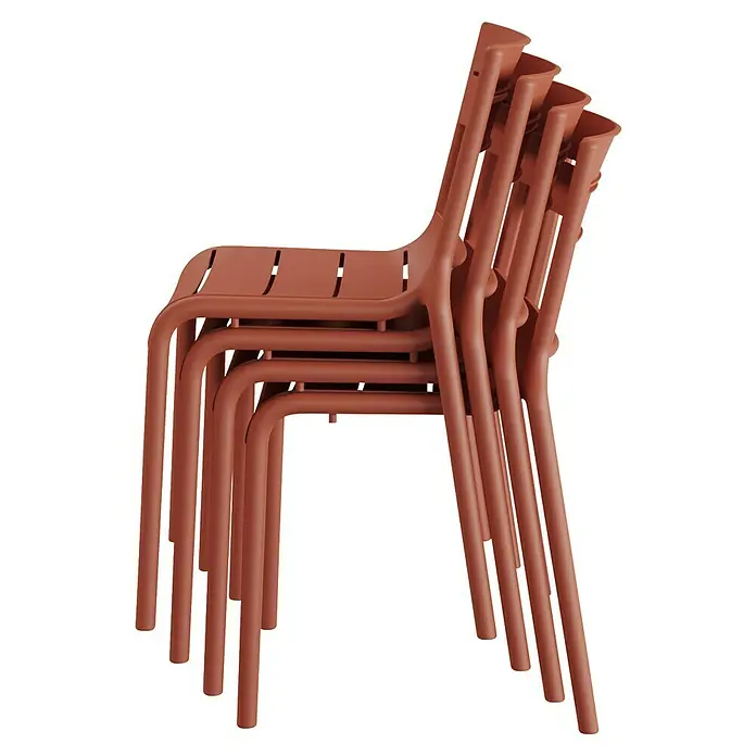 Stapelstuhl Calor - Polypropylen, Stapelbar, Terracotta, B x T x H: 49 x 55 x 82 cm - Stapel von Terrakottafarbenen HAY Stühlen, die modernes Design und Funktionalität für stilvolle Innen- und Außenbereiche bieten.