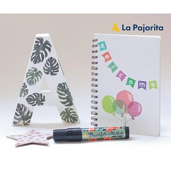 La Pajarita Marcador para ropa Transfer market direct - Incoloro - Una imagen inspiradora con un Transfer Marker, una letra A decorada y un cuaderno con globos y un letrero de "Welcome".
