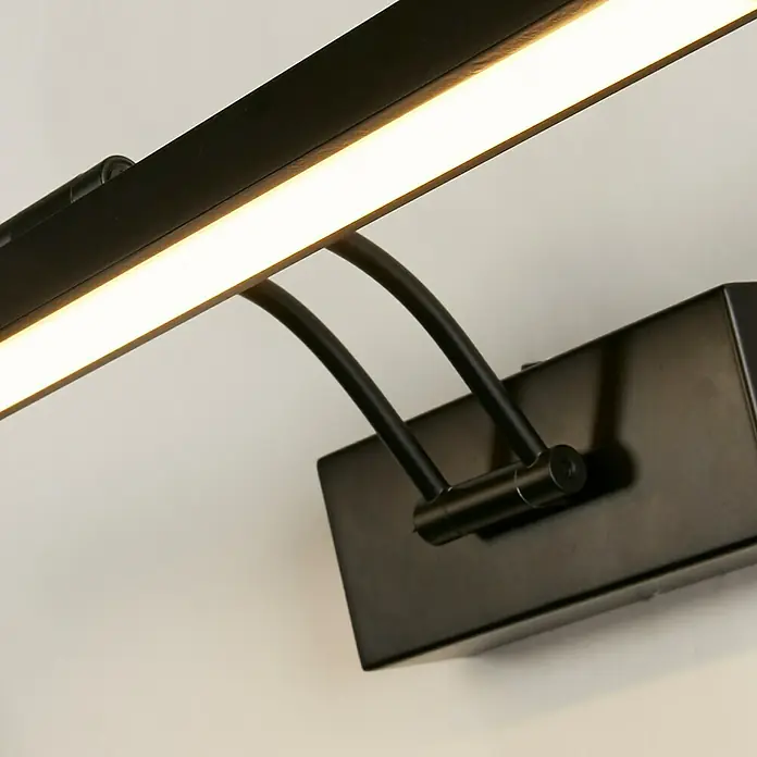 Searchlight LED-Bilderleuchte Rhodes - 9 W, L x B x H: 18 x 40 x 18 cm, Schwarz - Nahaufnahme einer modernen, schwarzen LED-Bilderleuchte, ideal zur Akzentuierung von Kunstwerken und Wohnraumgestaltung.