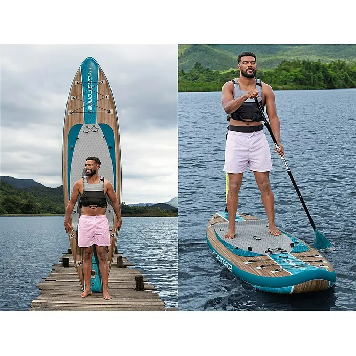 Bestway Hydro Force SUP-Board-Set Freesoul Elite™ mit Sitz - L x B x H: 335 x 84 x 15 cm, Nutzlast: 150 kg, Aufblasbar, Blau/Braun - Hydro Force Stand-Up-Paddleboard: Der Mann posiert am Ufer und paddelt auf dem See, genießt die Natur und das Board.