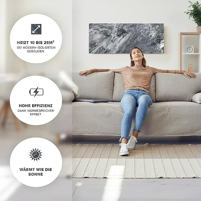 Marwona Infrarotheizkörper Infrarotheizung - 800 W, Shadow Grey 800 Watt Smart Home - Frau entspannt sich vor einer modernen Marmor-Heizung. Das Produkt heizt bis zu 25m² und ist energieeffizient.